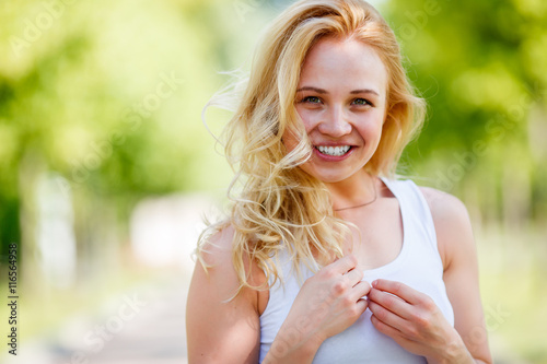 Portrait of playful young girl with long wavy hair