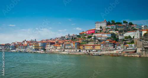 Old town cityscape on the Douro River with traditional Rabelo boats in Porto  Portugal