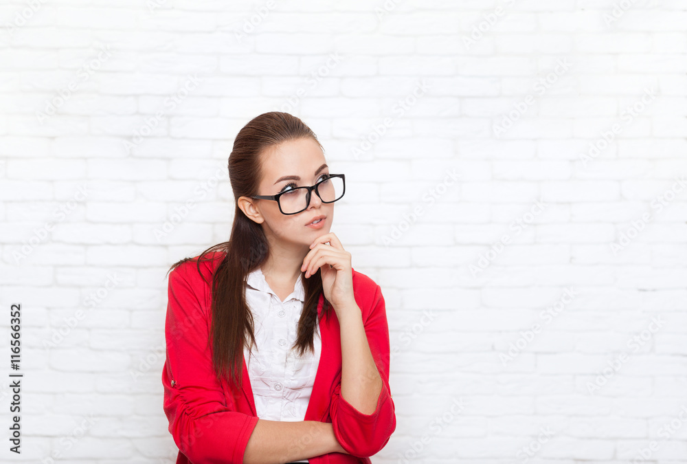 Businesswoman look up to copy space wear red jacket glasses seriuos think Businesswoman look up to copy space wear red jacket glasses seriuos think