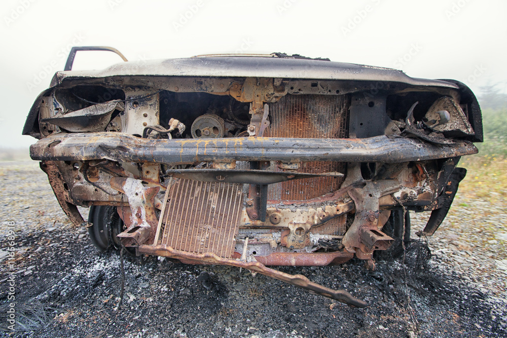 Front view of a burnt out car