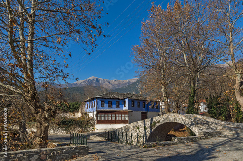 Old house and Stone bridgein Moushteni near Kavala, East Macedonia and Thrace, Greece photo