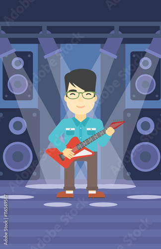 Musician playing electric guitar.
