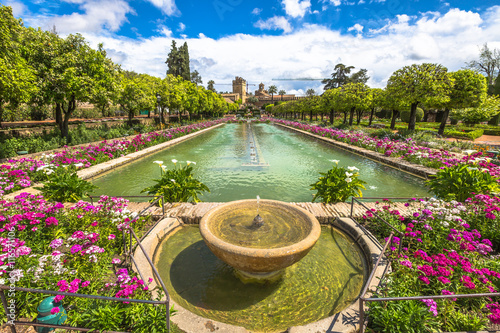 The popular gardens with fountains of Alcazar de los Reyes Cristianos, a medieval building and popular tourist attraction, located in the Andalusian city of Cordoba, Spain.