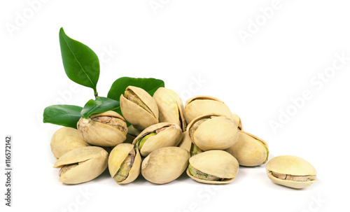 Pistachios with green leaves