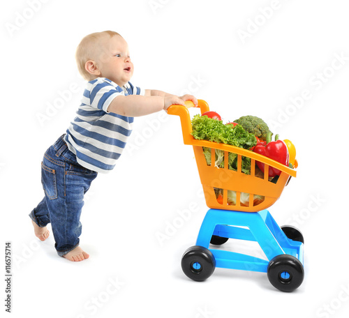 Cute baby with shopping tro...