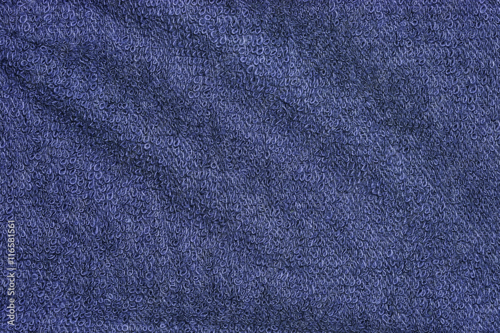 Dark blue cotton bath towels texture or towels background for design with copy space for text or ...