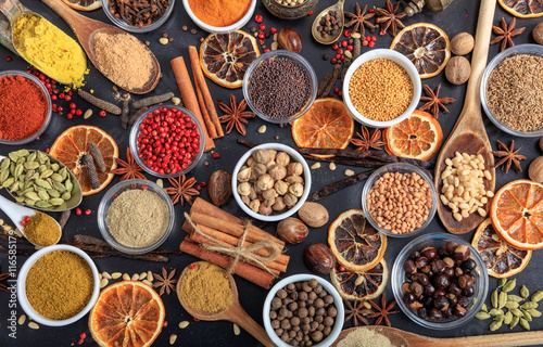 Fototapeta Naklejka Na Ścianę i Meble -  Composition of spices on a black background
