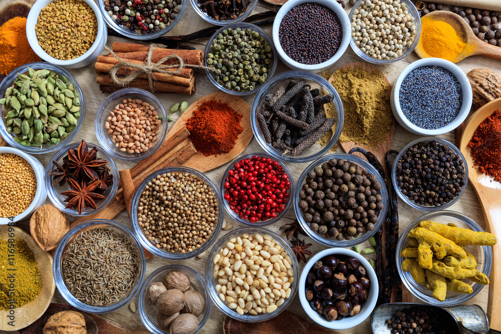 Composition of spices on a wooden surface Composition of spices on a wooden surface