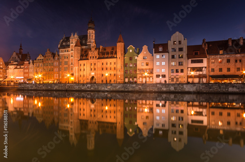 Medieval waterfront reflecting in Motlawa river, Gdansk, Poland © tomeyk