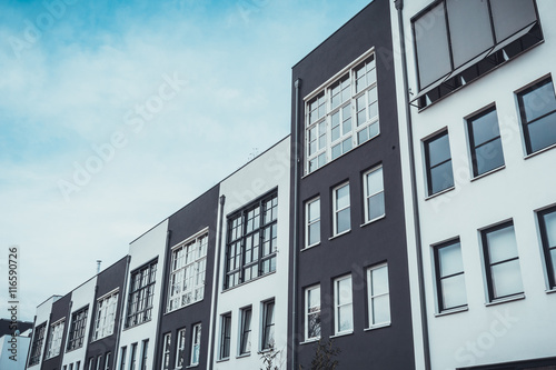 Rows of alternating black and white lofts