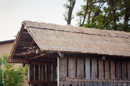 Wooden barn in village © yanakoles