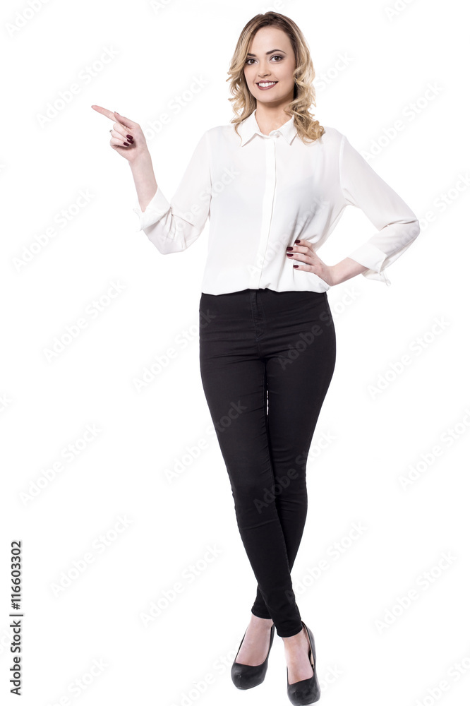 Attractive business woman pointing at something Attractive business woman pointing at something