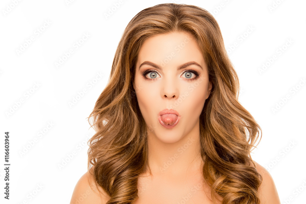 Portrait of pretty funny young girl showing tongue Portrait of pretty funny young girl showing tongue