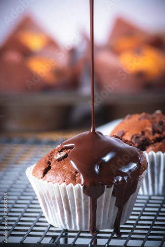 Muffins topped with warm chocolate