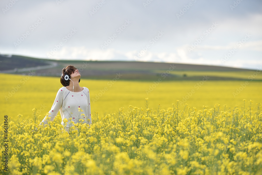 Fototapeta premium Young woman with headphones