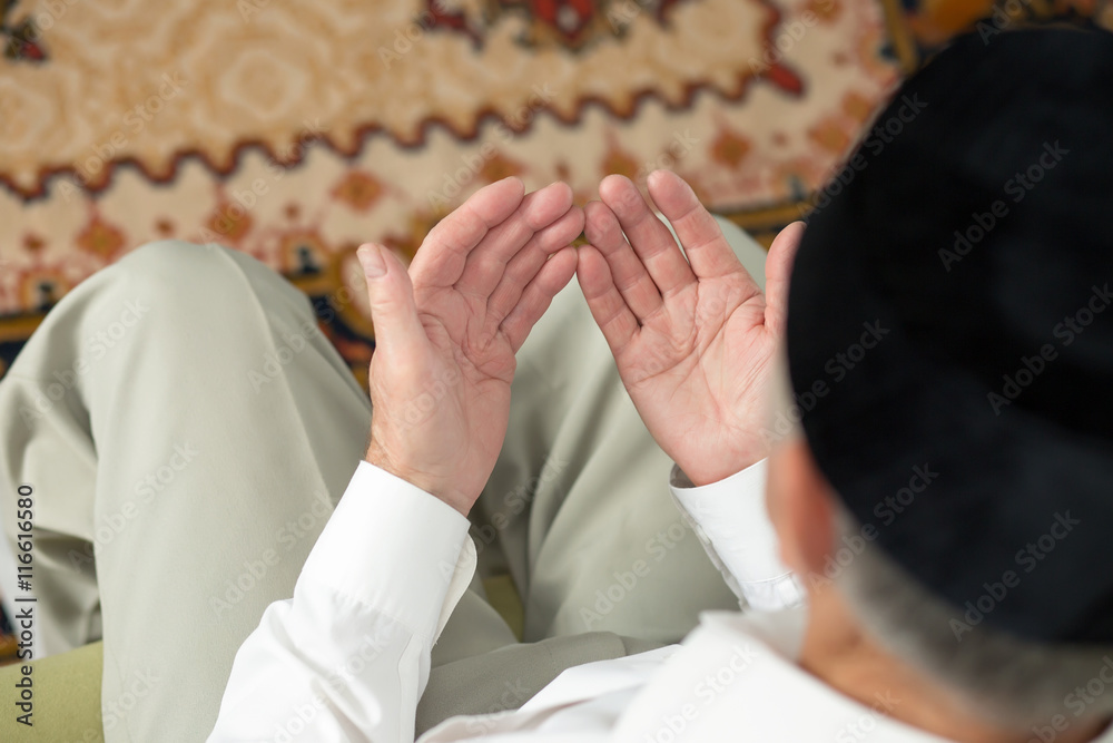 Praying hands of an old man. Selective focus Praying hands of an old man. Selective focus