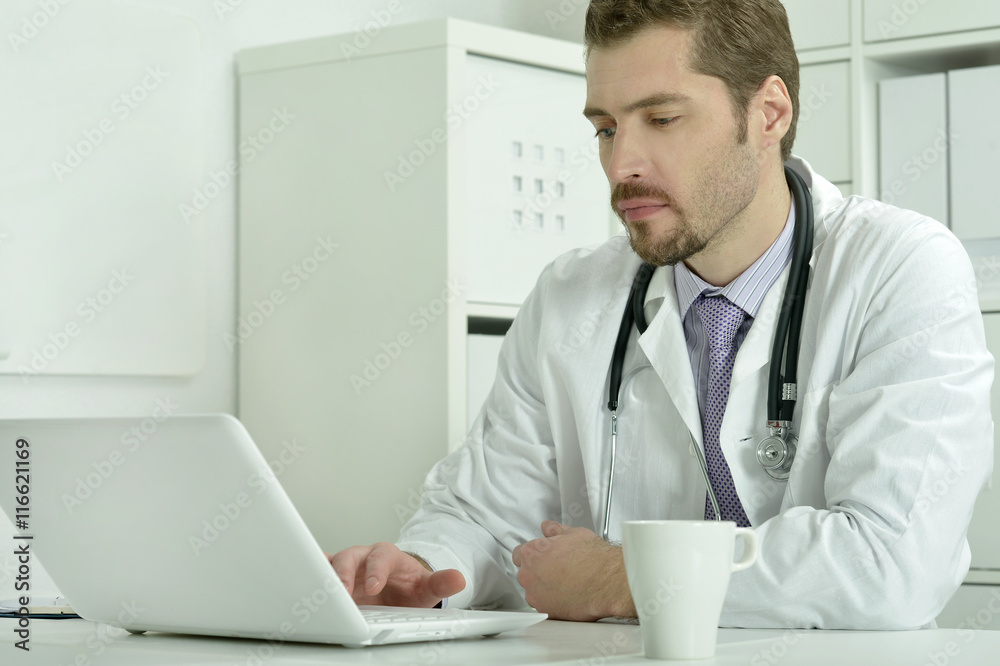Fototapeta premium Medical doctor working with laptop