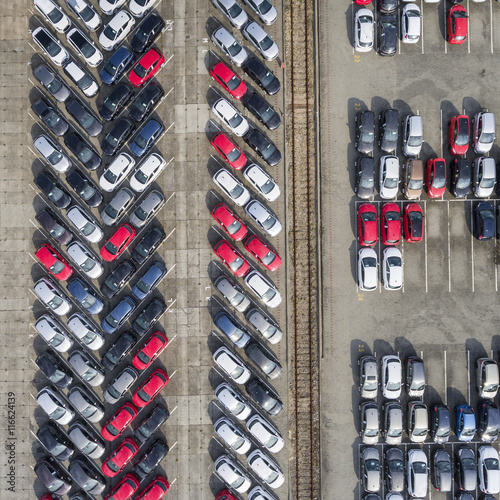 Aerial view lot of vehicles on parking for new car.