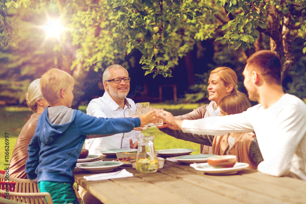 happy family having holiday dinner outdoors happy family having holiday dinner outdoors