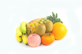 ripe pineapple, apple,orange, persimmon, kiwi, banana on white background