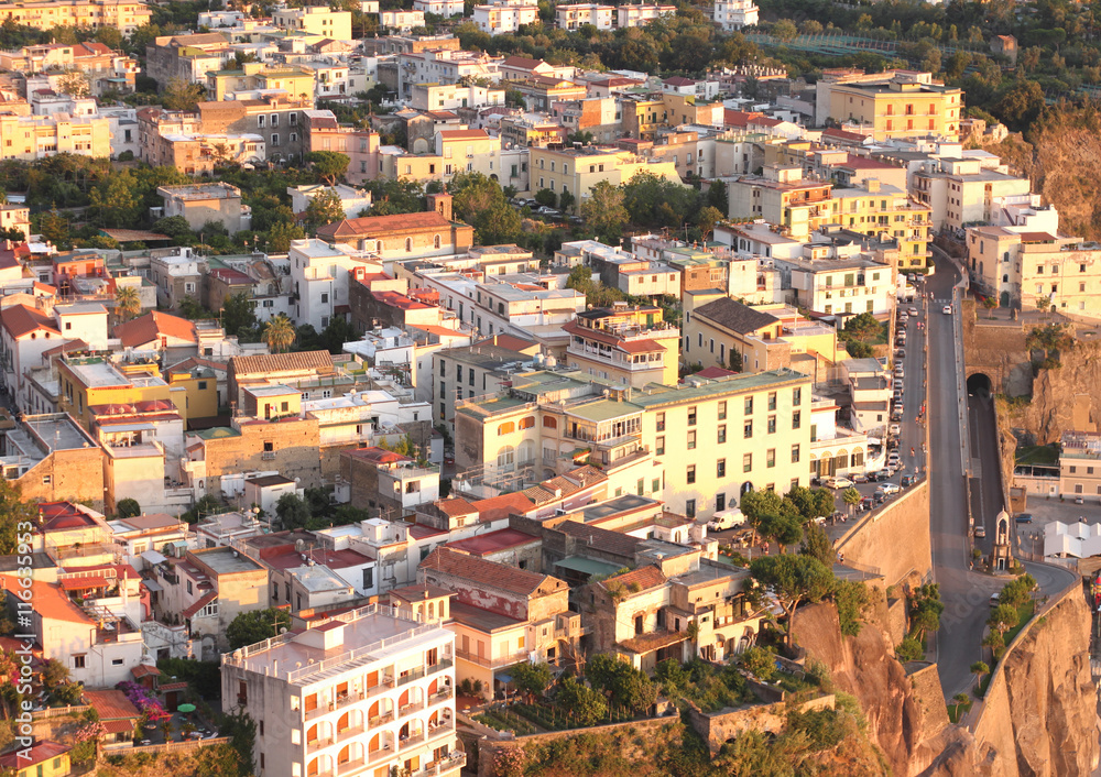 Beautiful city landscape in style of traditional Italian architecture at sunset. Amalfi Coast, Italy.