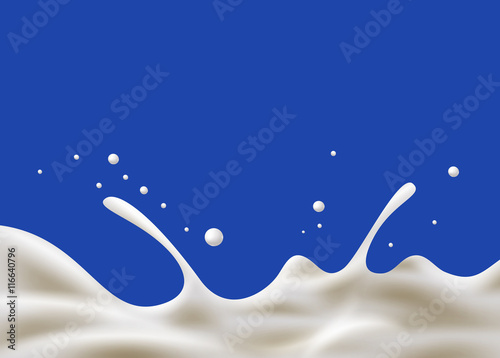 milk splash on blue background