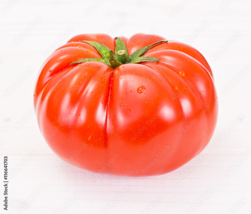 Red Tomatoes Isolated on a White Background Red Tomatoes Isolated on a White Background