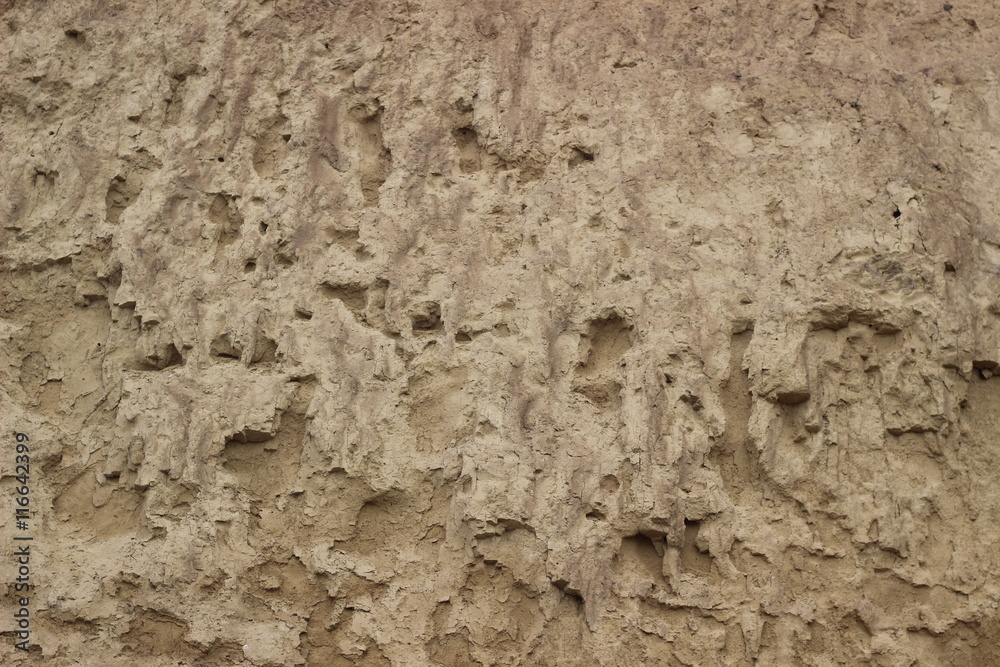 Cliff of the brown orange clay. Texture for background Cliff of the brown orange clay. Texture for background