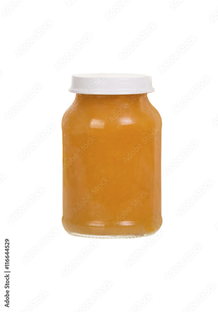 mashed for the child of a peach in a jar on a white background mashed for the child of a peach in a jar on a white background