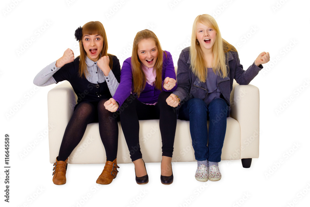 Jubilant young woman on sofa