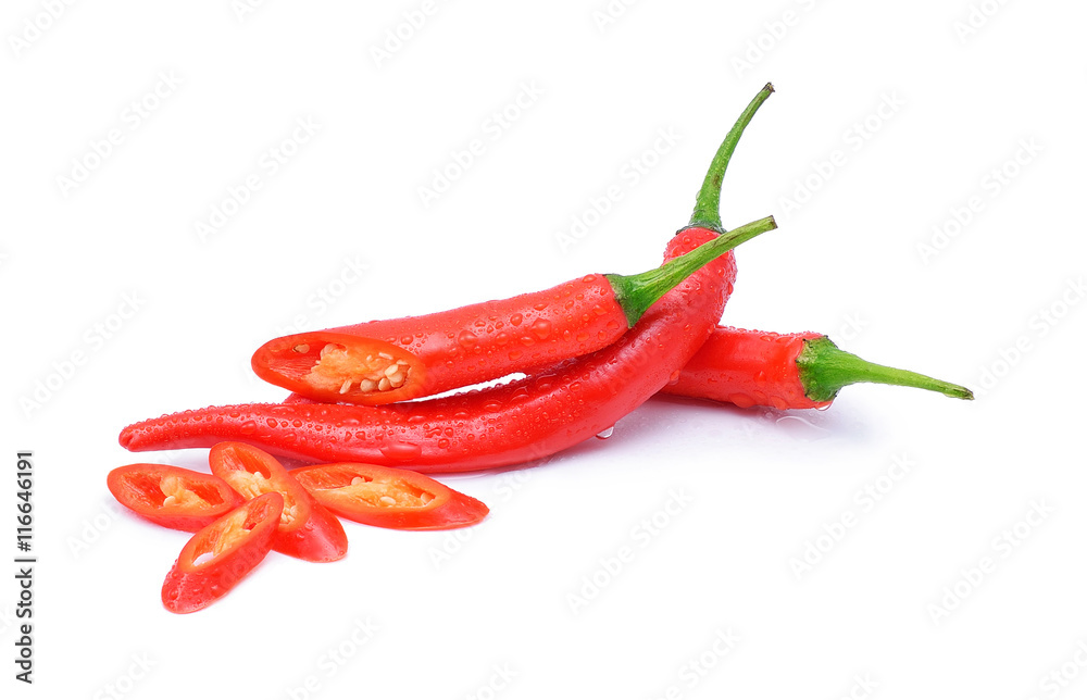 Red chili pepper with water drops on white background.