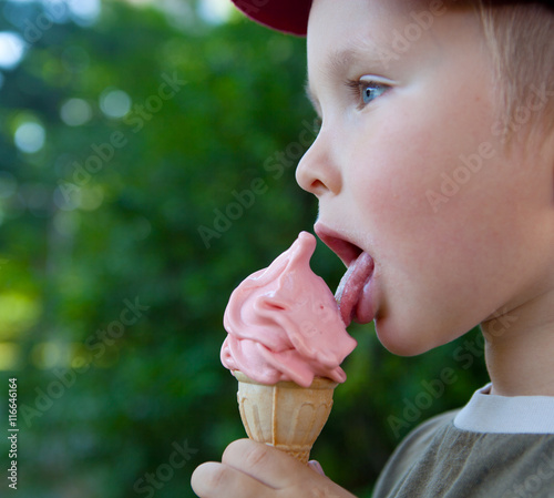 small child eating ice cream