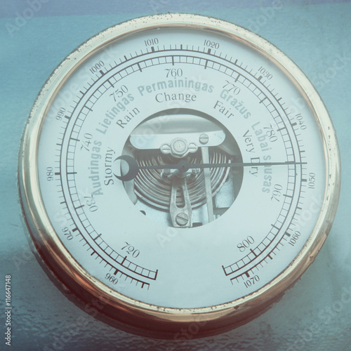 Retro barometer close up photo in vintage style