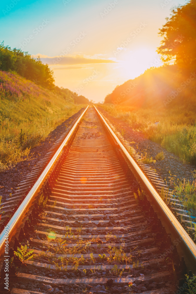 Railway Going Straight Ahead Through Summer Hilly Meadow To Suns Railway Going Straight Ahead Through Summer Hilly Meadow To Suns