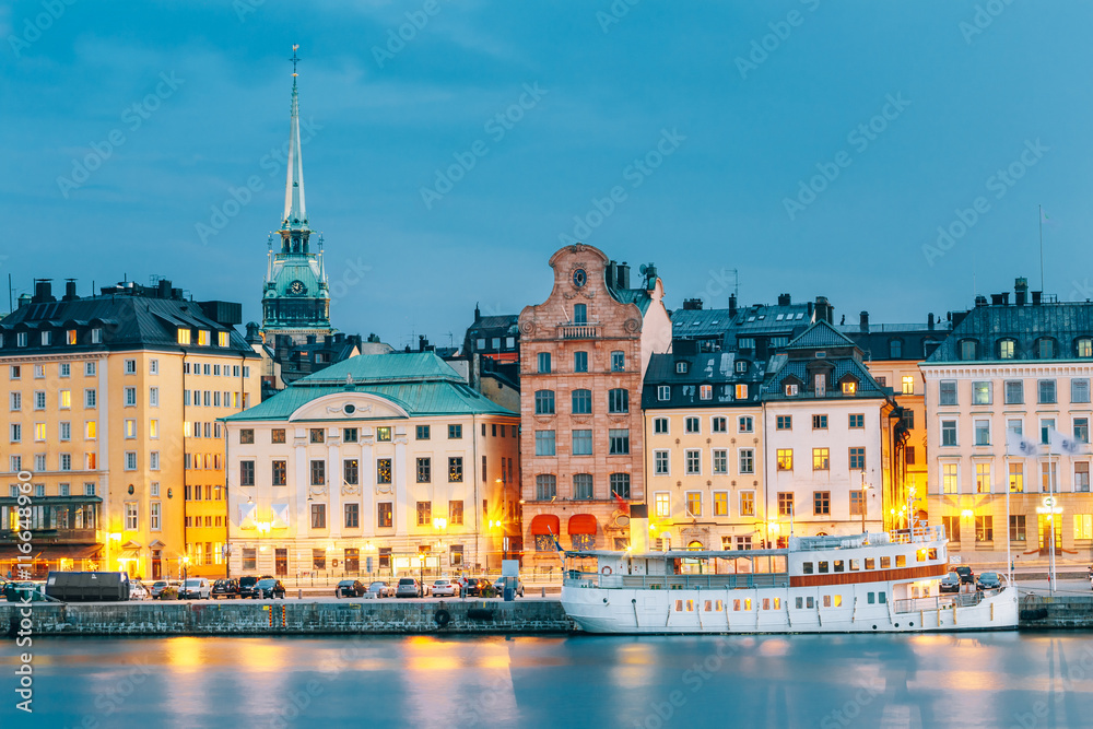 Scenic View Of Embankment In Old Part Of Stockholm At Summer Evening