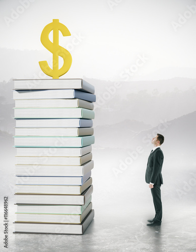 Photos Man looking at dollar sign