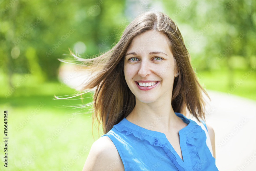 Naklejka premium Portrait of beautiful young happy woman