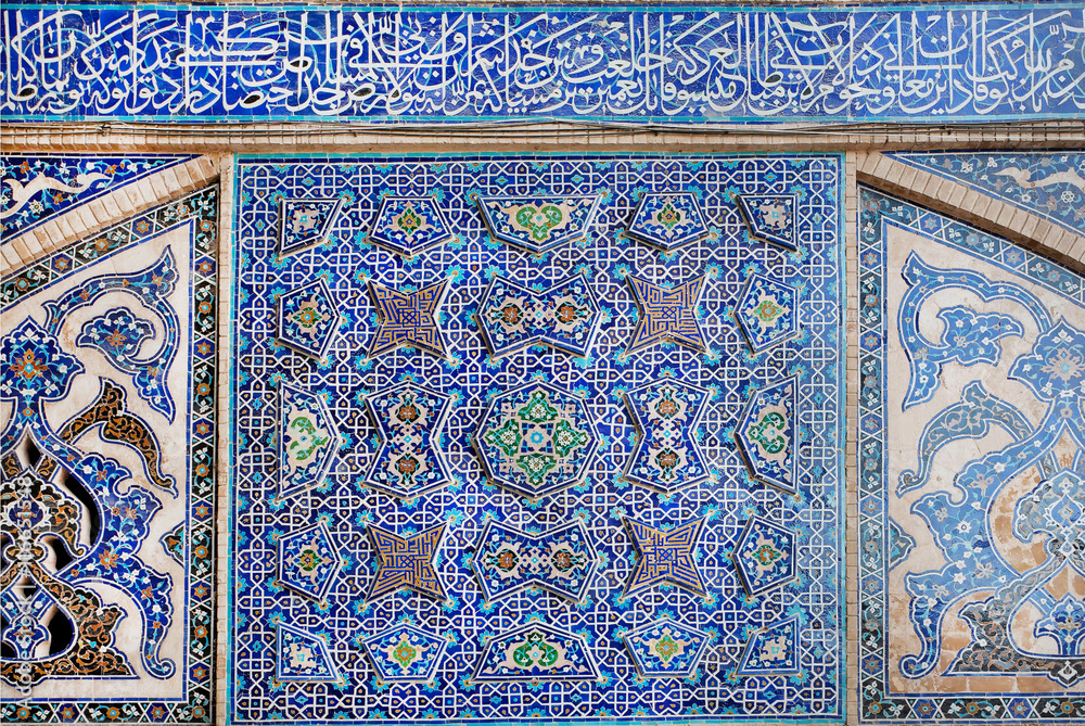 Old tiled design with traditional Persian patterns on wall