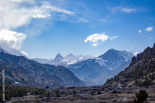 Snow mountain and rural region landscape with clear blue sky  Annapurna Conservation Area  Nepal
