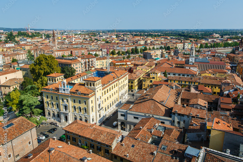 Panoramic view of Verona city in Italy. View of the red roofs in romantic city. Verona is a popular tourist destination of Europe.
