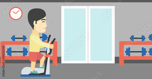 Man exercising on elliptical trainer.