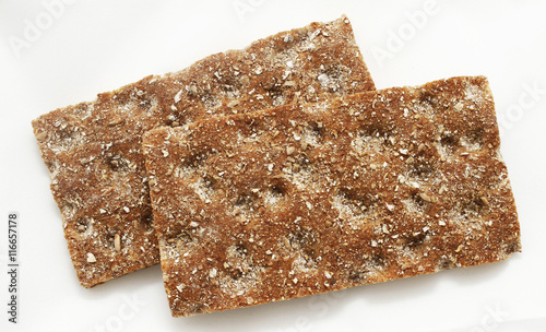 Obraz na plátně Two slices of Scandinavian hard bread from Finland.