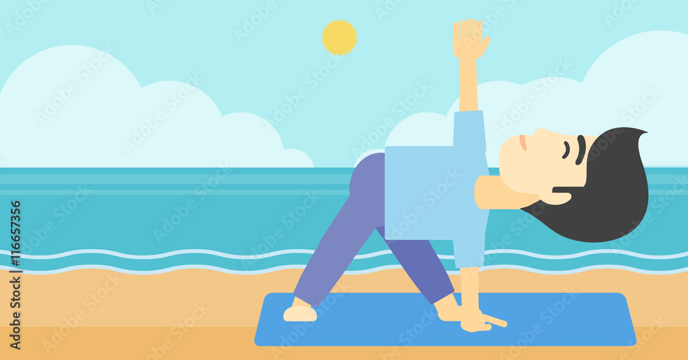 Man practicing yoga triangle pose on the beach.
