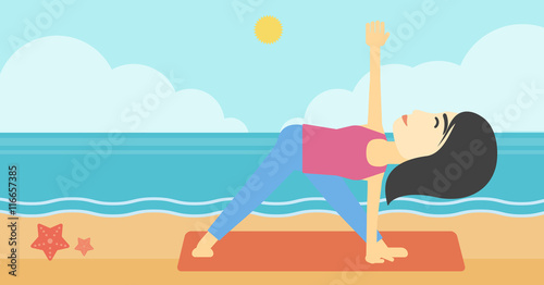 Woman practicing yoga triangle pose on the beach. © Visual Generation