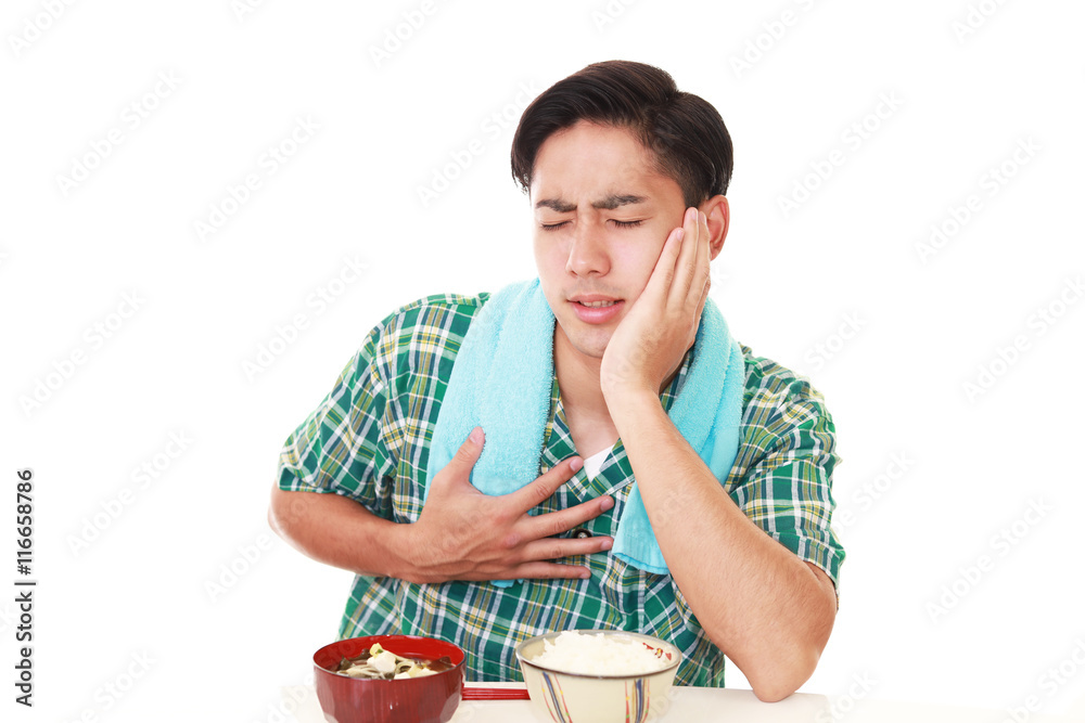 食欲不振の男性