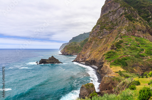 Amazing view of mountains and ocean on the northern coast of Madeira near Boaventura, Portugal