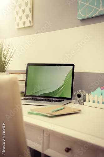 Stylish workplace with laptop at home, closeup © Africa Studio