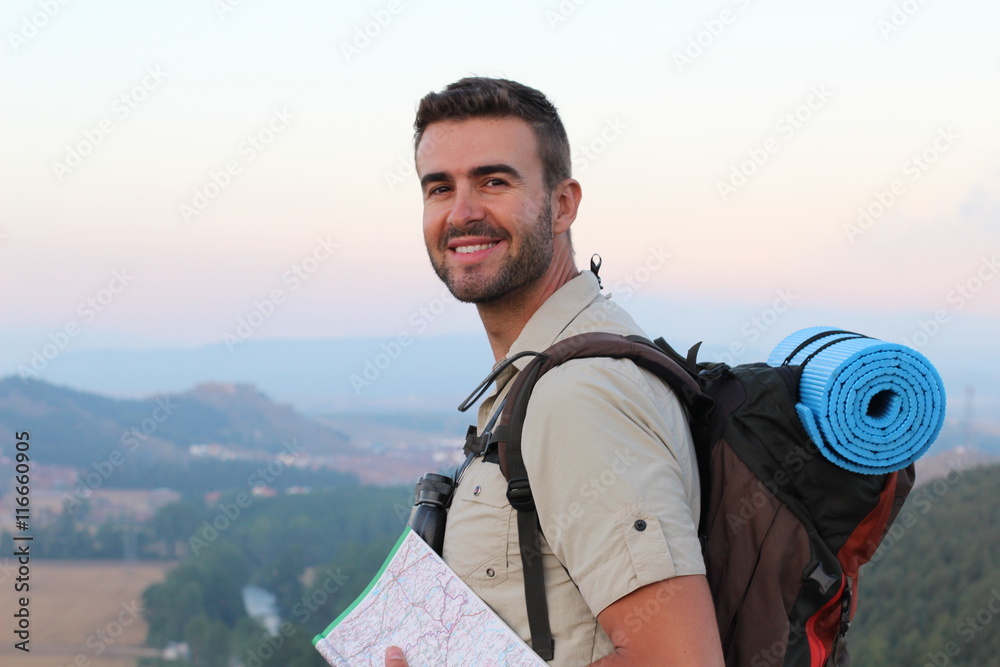 Front view of woman with backpack hiking in the top of the mountains Front view of woman with backpack hiking in the top of the mountains