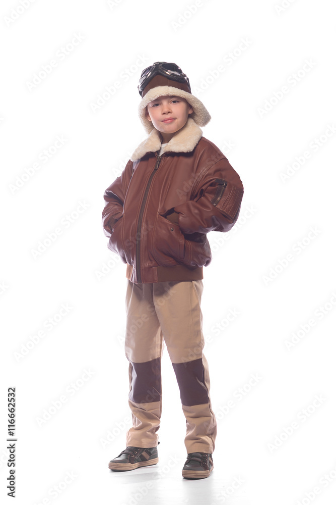 the boy is an aviator in the jacket of the pilot and in old glasses the boy is an aviator in the jacket of the pilot and in old glasses