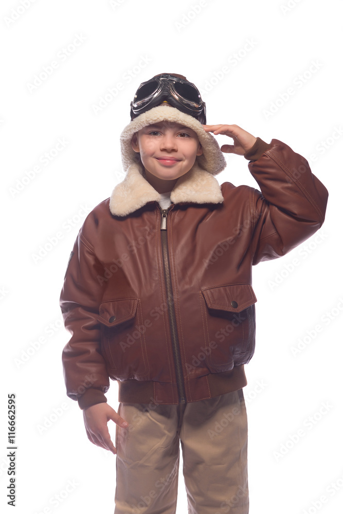 the boy is an aviator in the jacket of the pilot and in old glasses the boy is an aviator in the jacket of the pilot and in old glasses